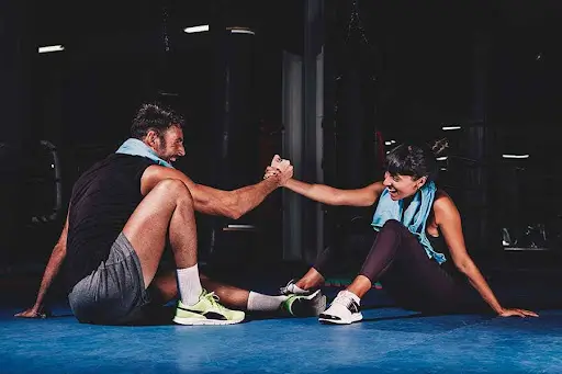 two persons doing exercise