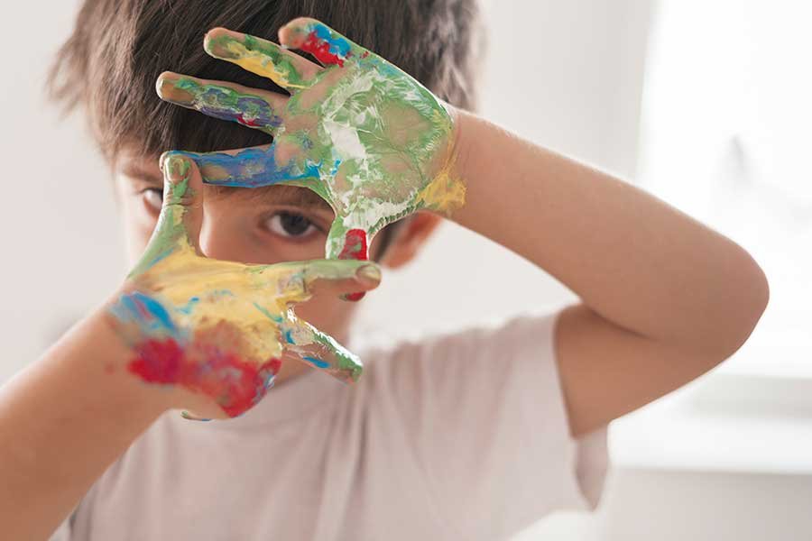 Teen playing with colors